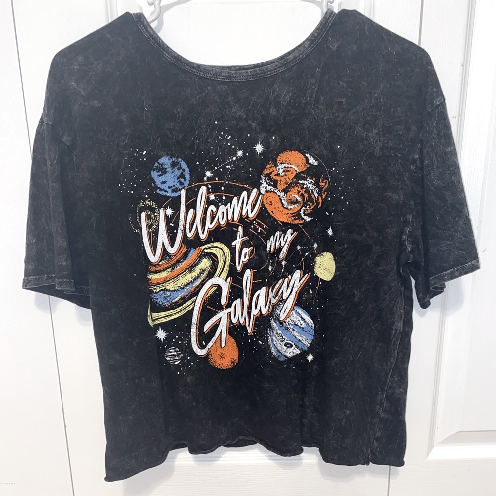 A graphic tee from caution to the wind